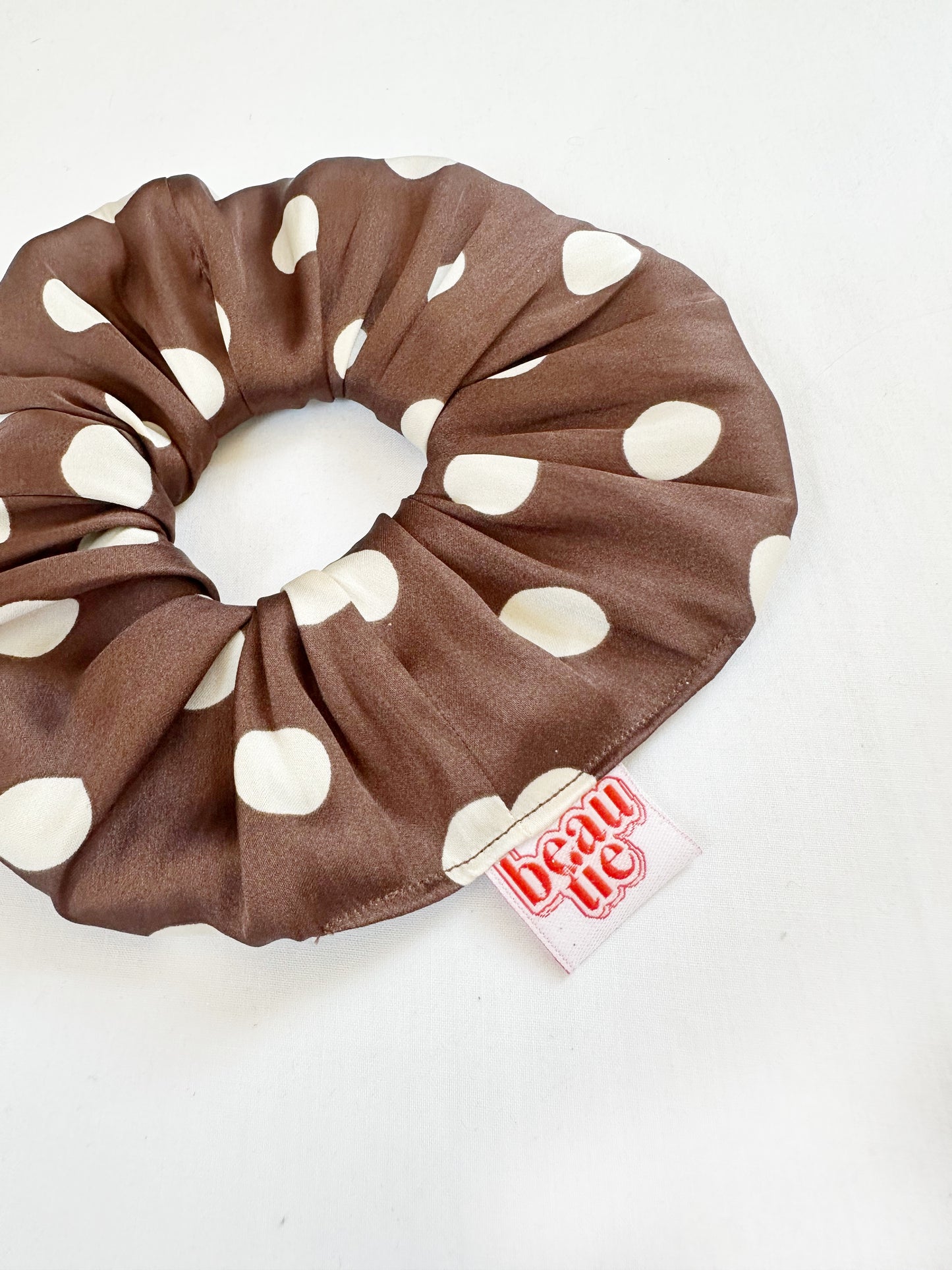 The OG scrunchie in brown polka dot