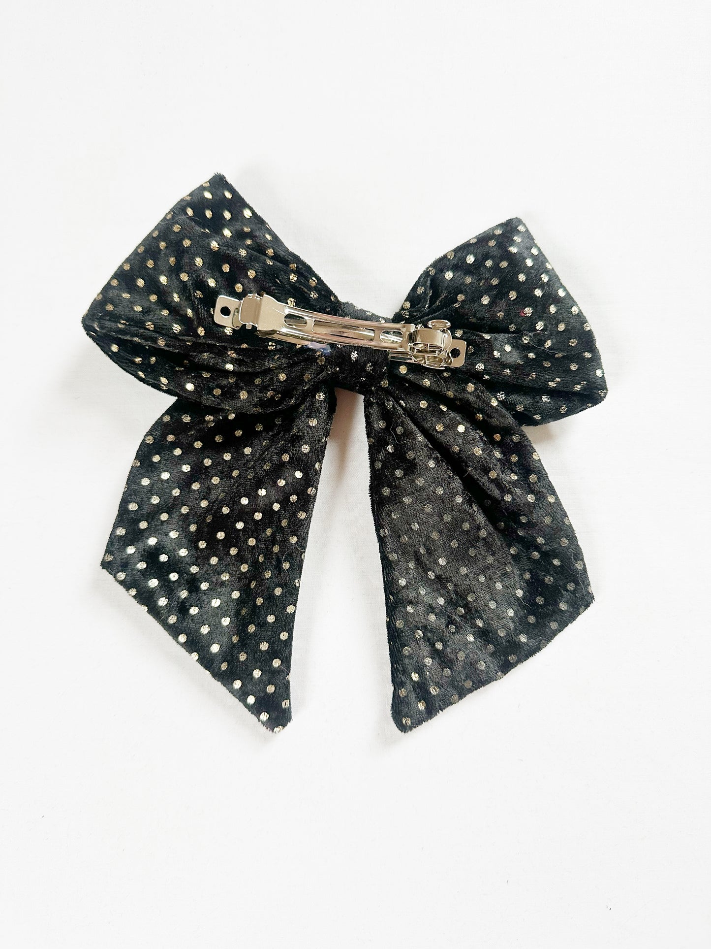 Beau hair bow in black and gold velvet