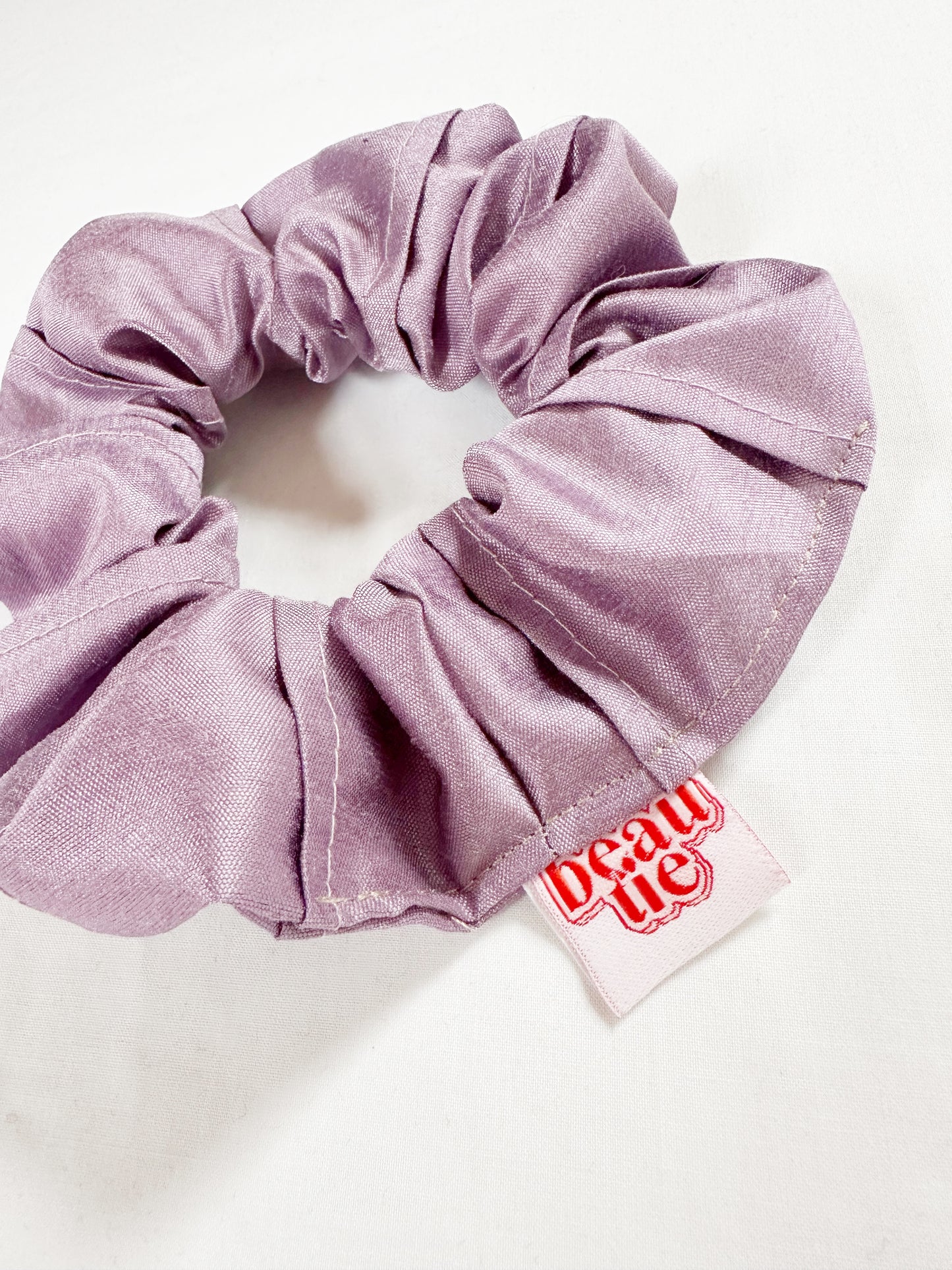 OG scrunchie in pleated lilac silk