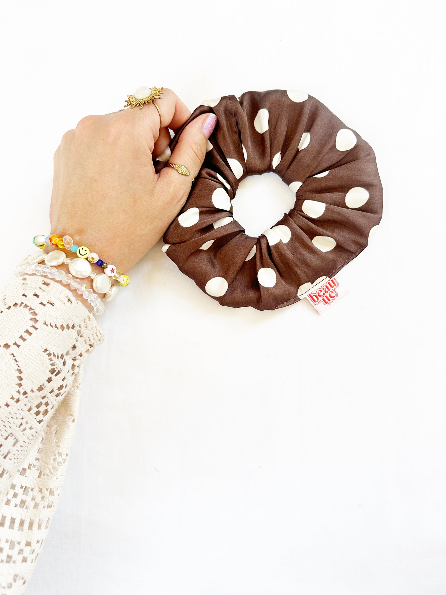 The OG scrunchie in brown polka dot