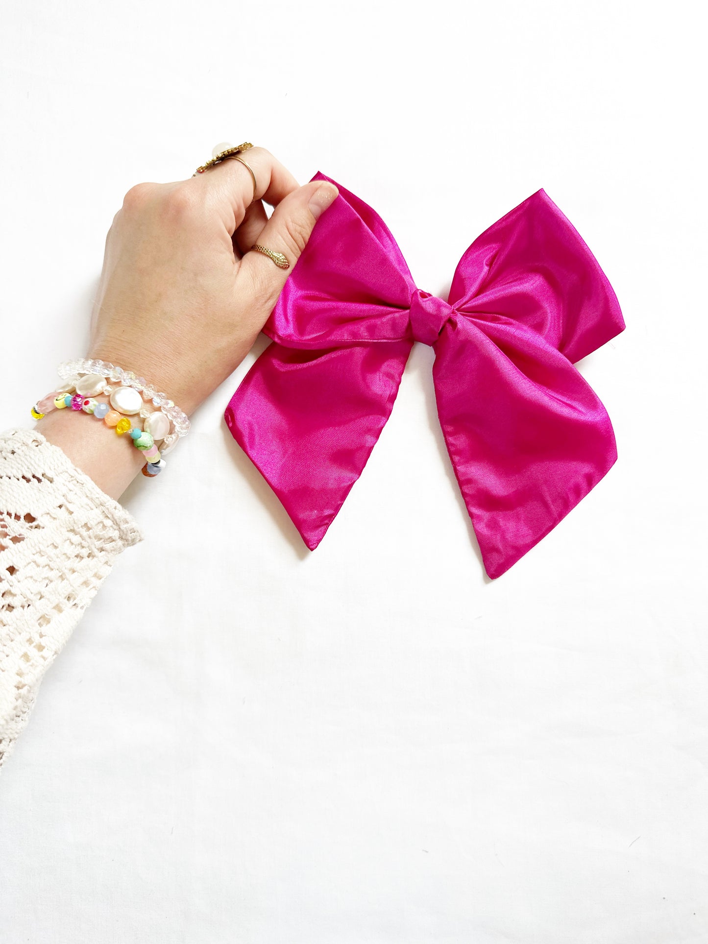 Beau hair bow in magenta pink silk