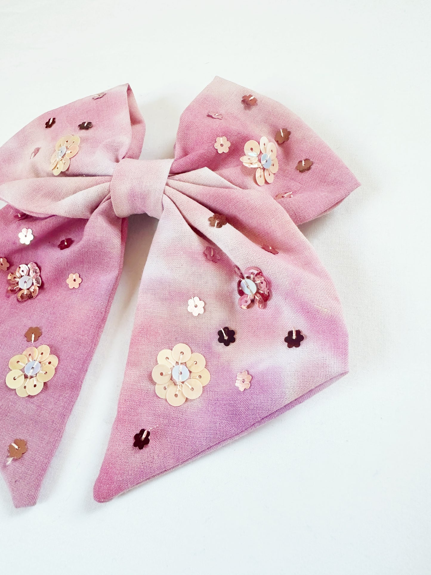 The Queen Bee - Hair Bow in pink tie dye with sequin flowers