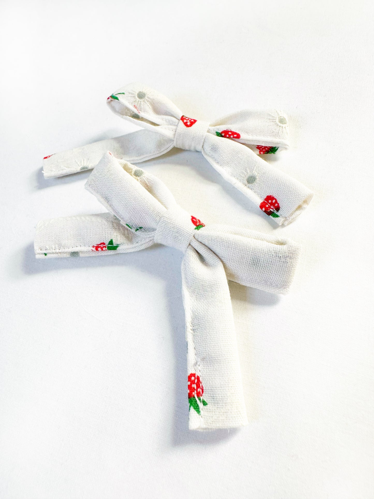 Bonnie mini hair bows in strawberry print