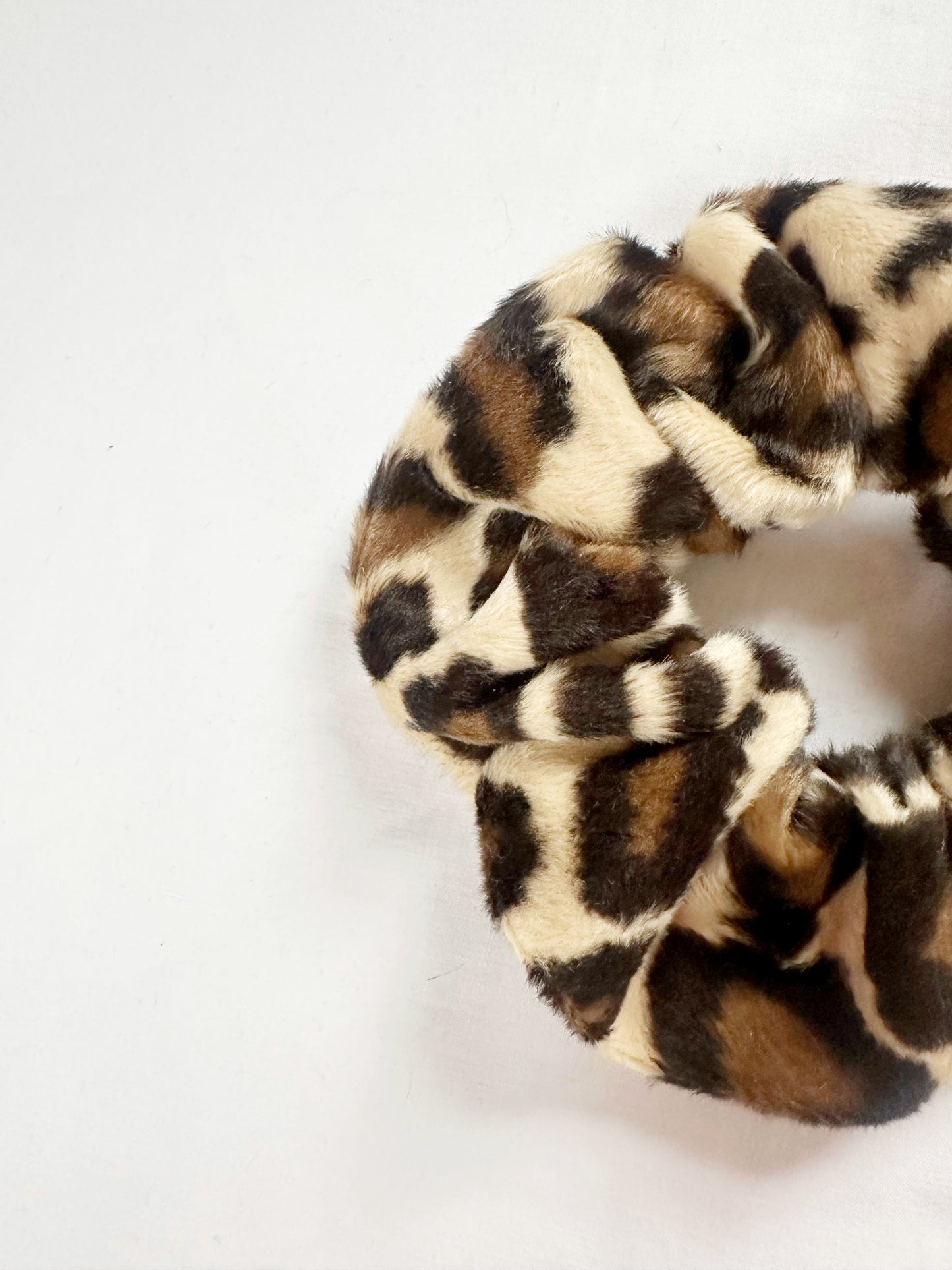 OG scrunchie in leopard faux fur