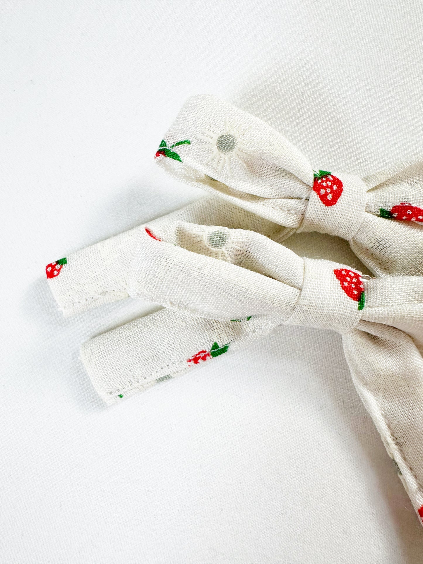 Bonnie mini hair bows in strawberry print