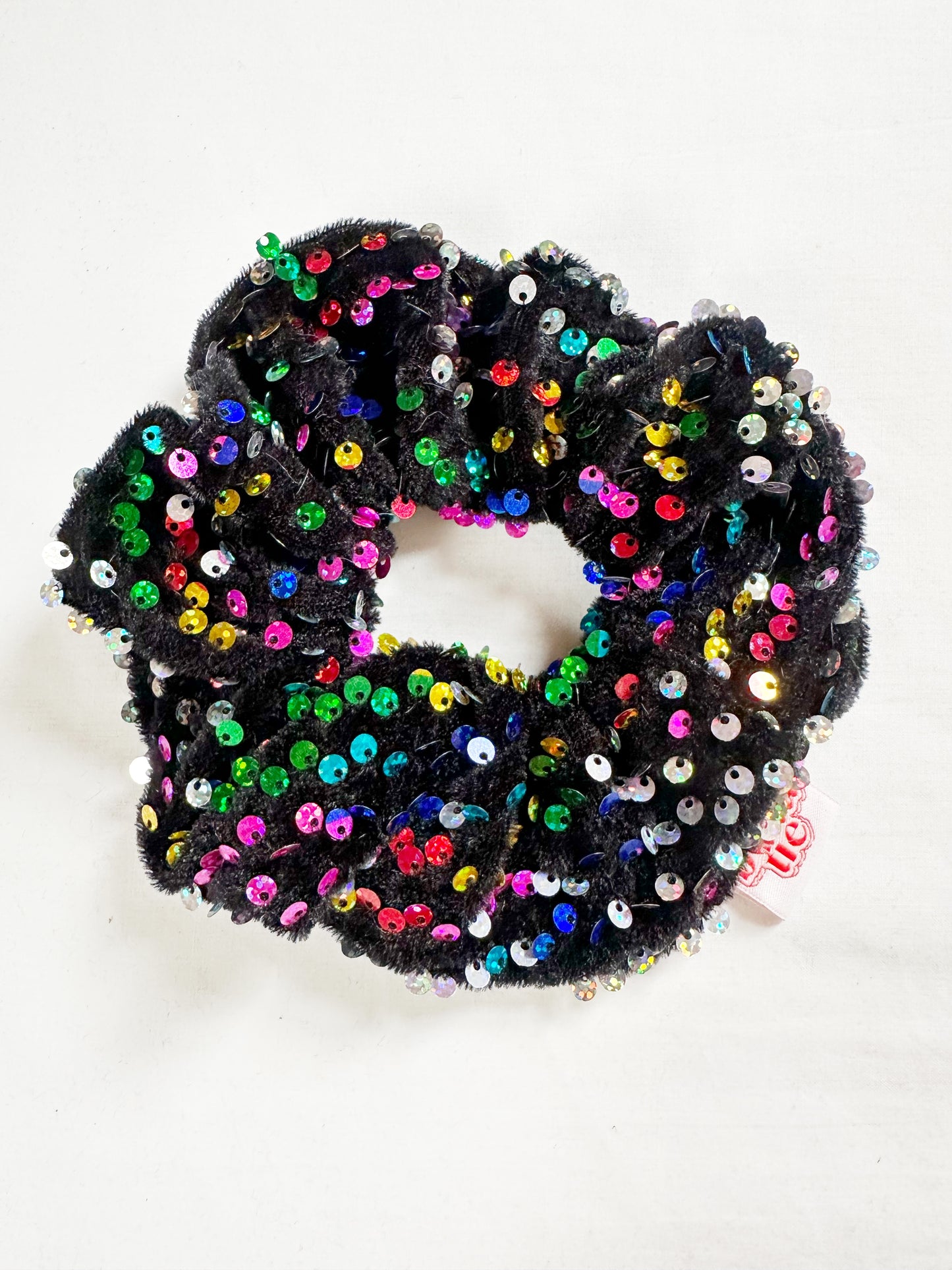 OG scrunchie in rainbow sequins