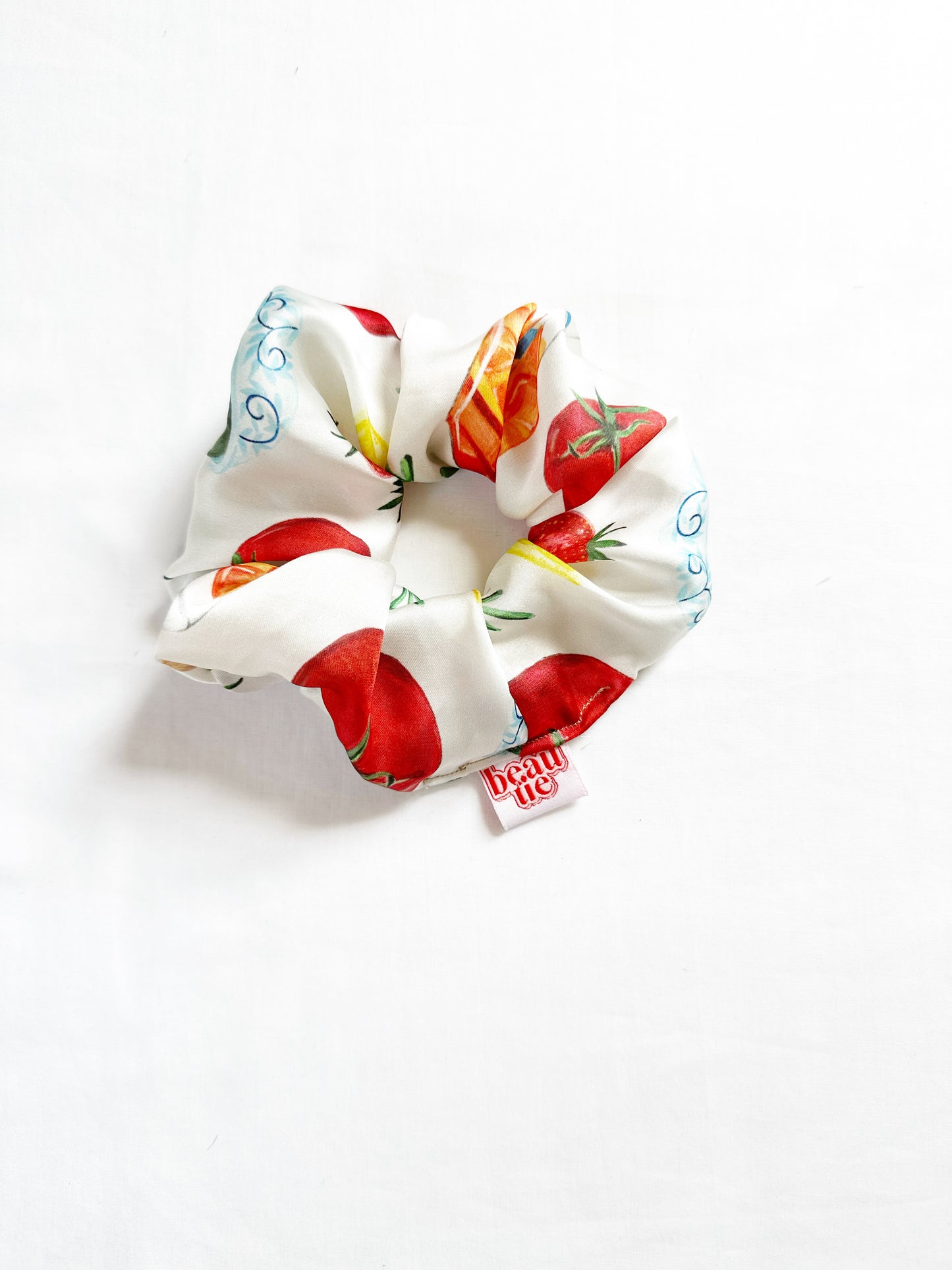 The OG scrunchie with Aperol Spritz print