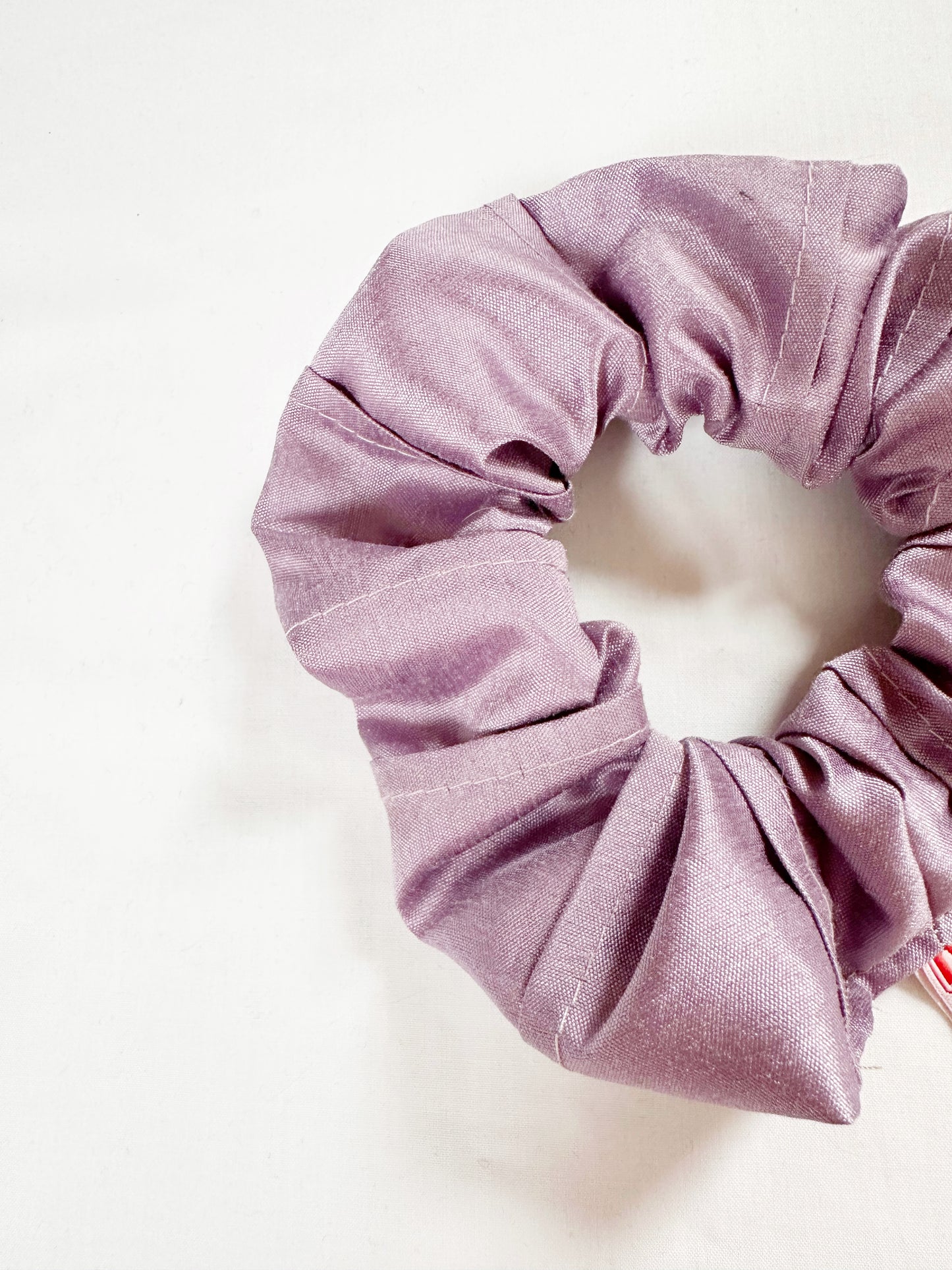 OG scrunchie in pleated lilac silk