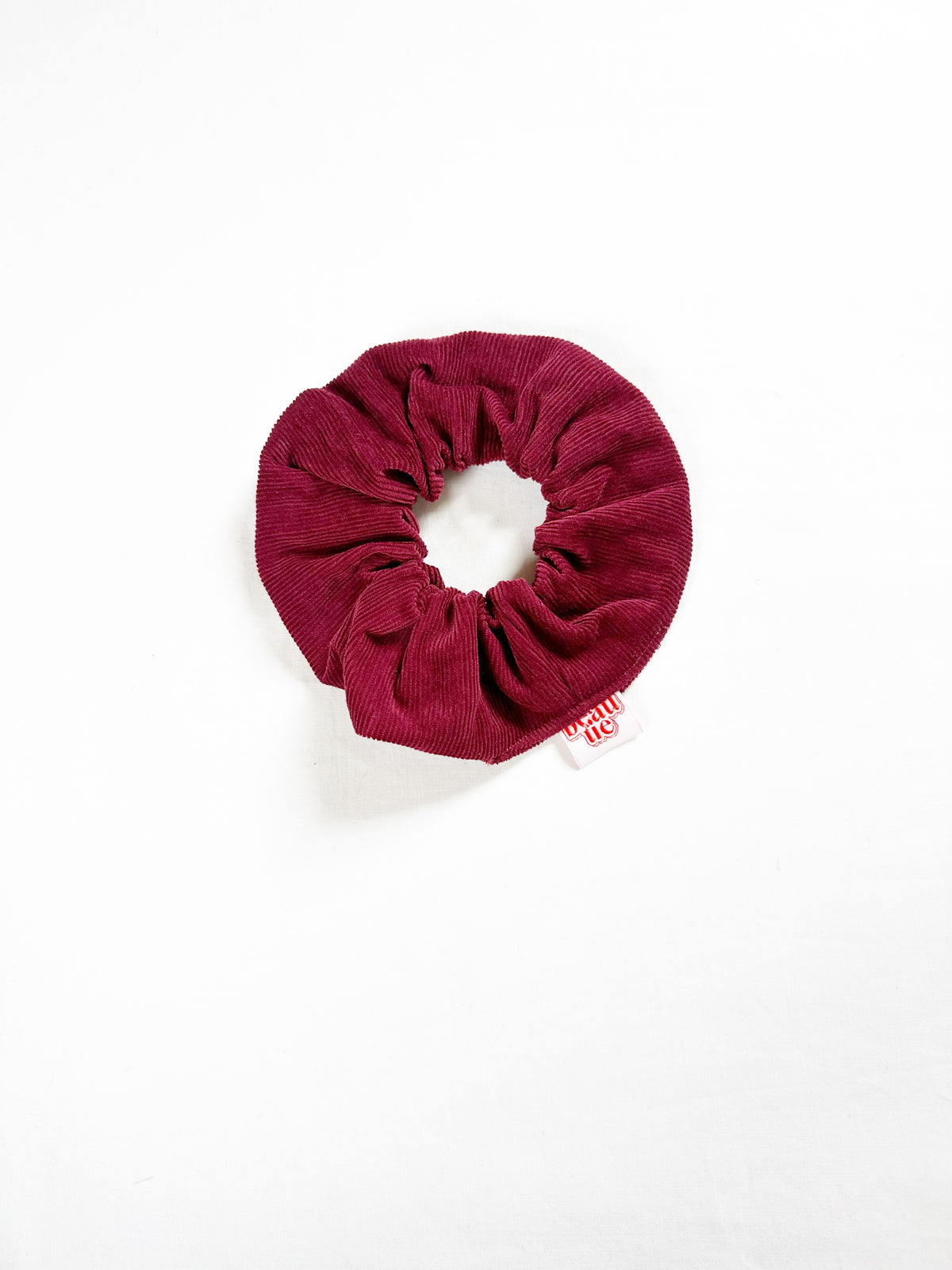 OG scrunchie in burgundy corduroy