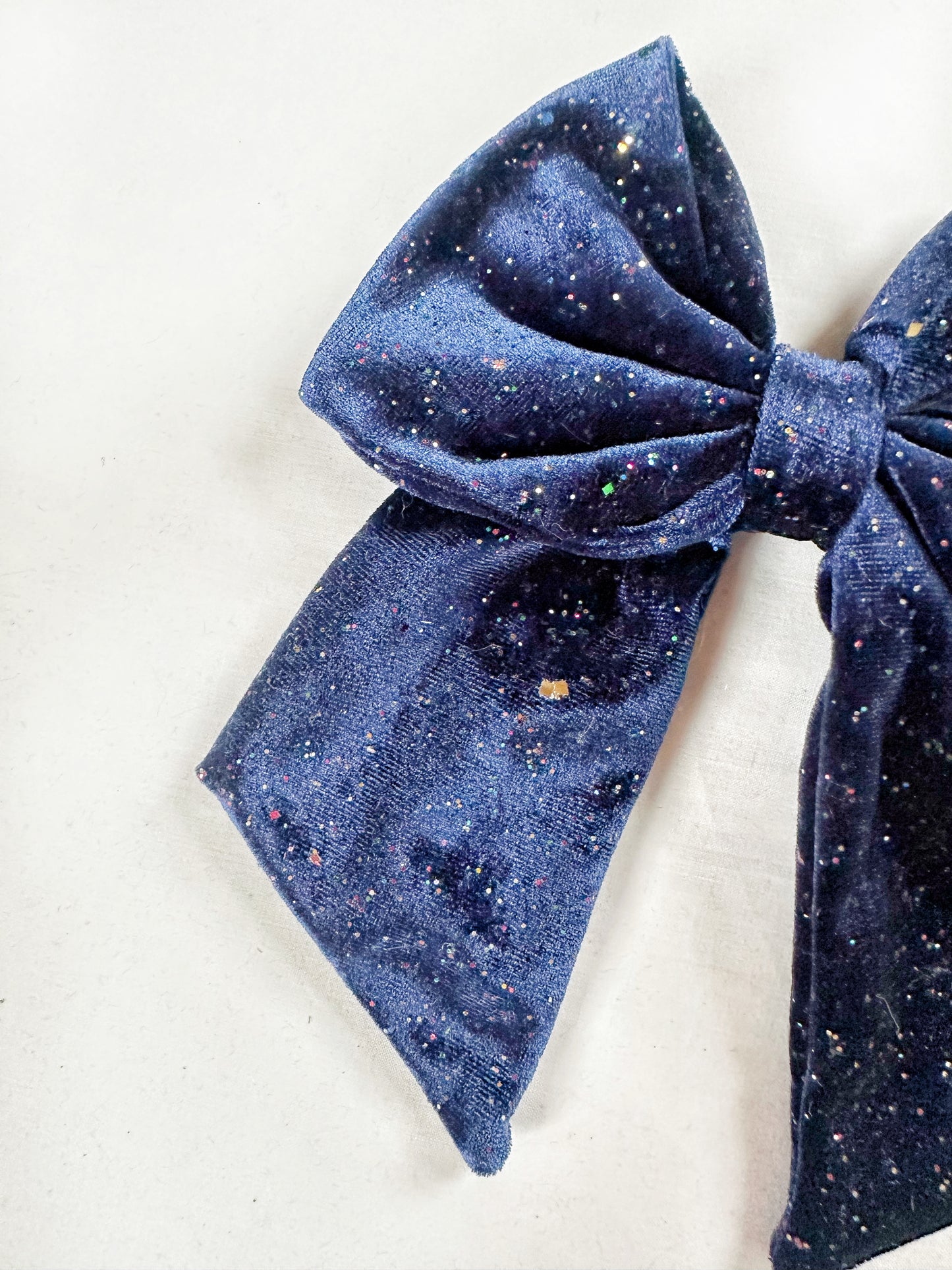 Beau hair bow in blue velvet glitter