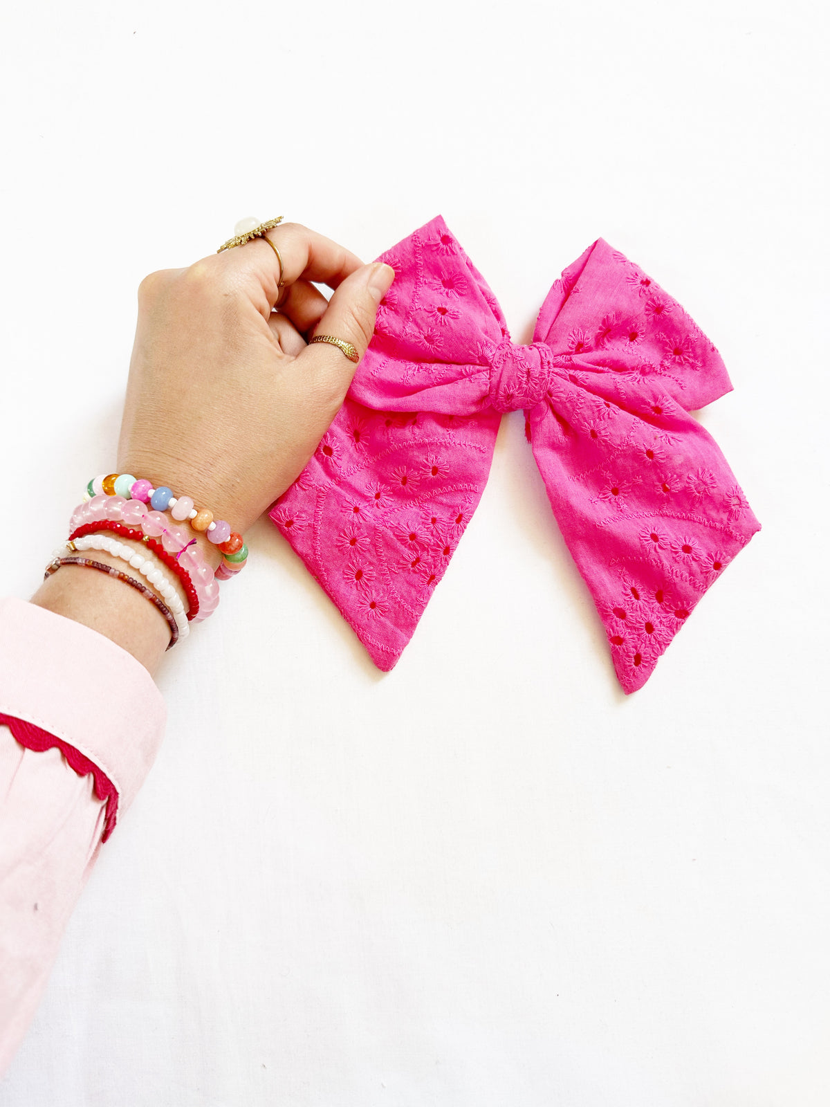 Beau hair bow in hot pink broderie
