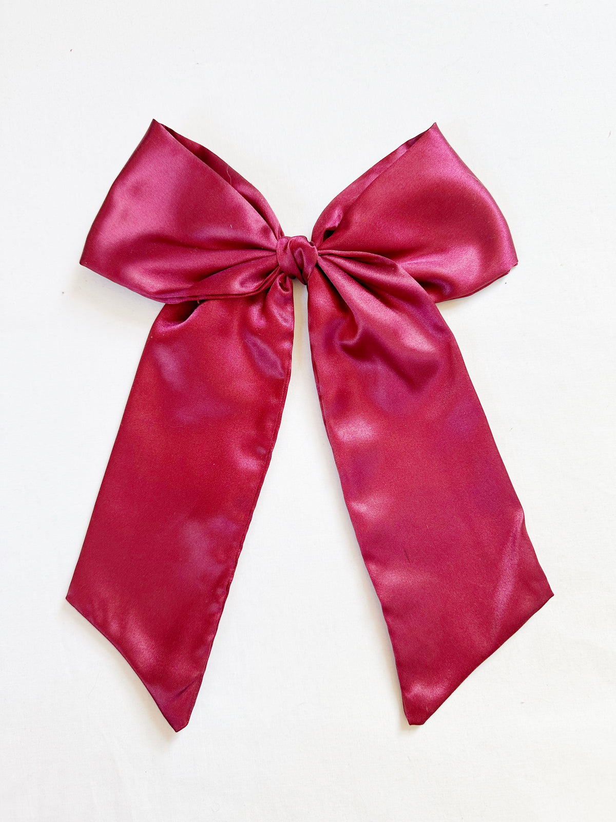 The Power Hair Bow in burgundy silk