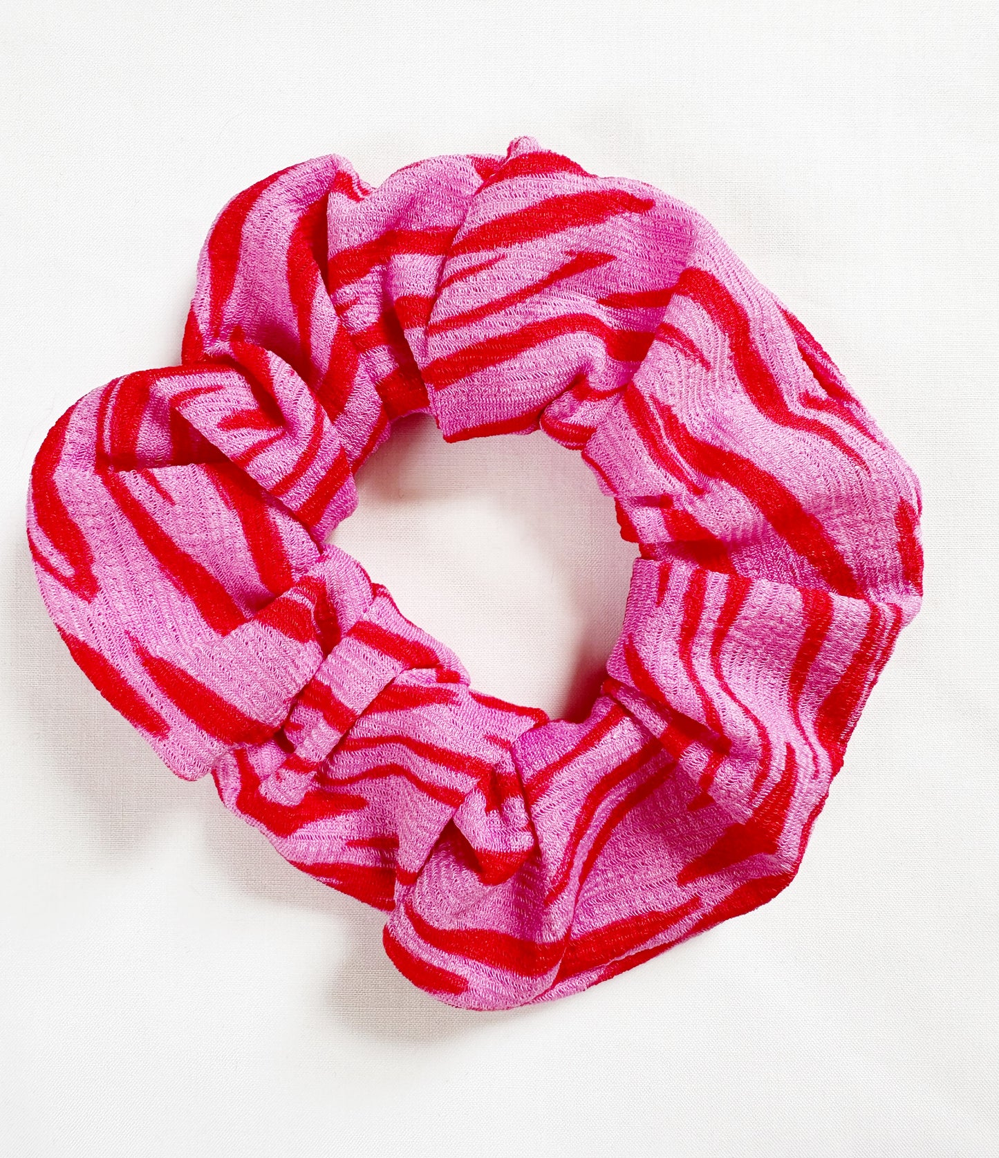 OG scrunchie in pink and red zebra