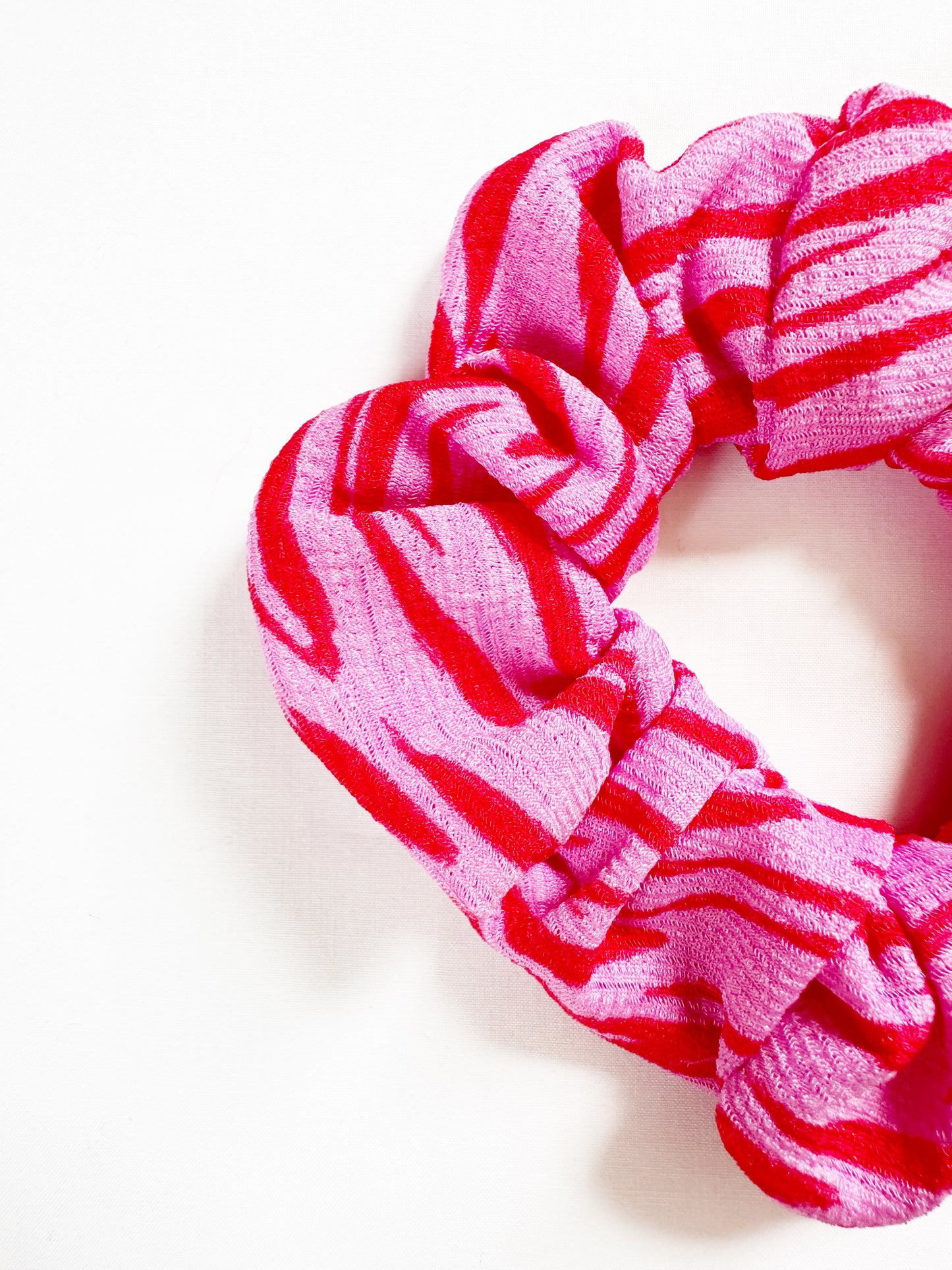 OG scrunchie in pink and red zebra