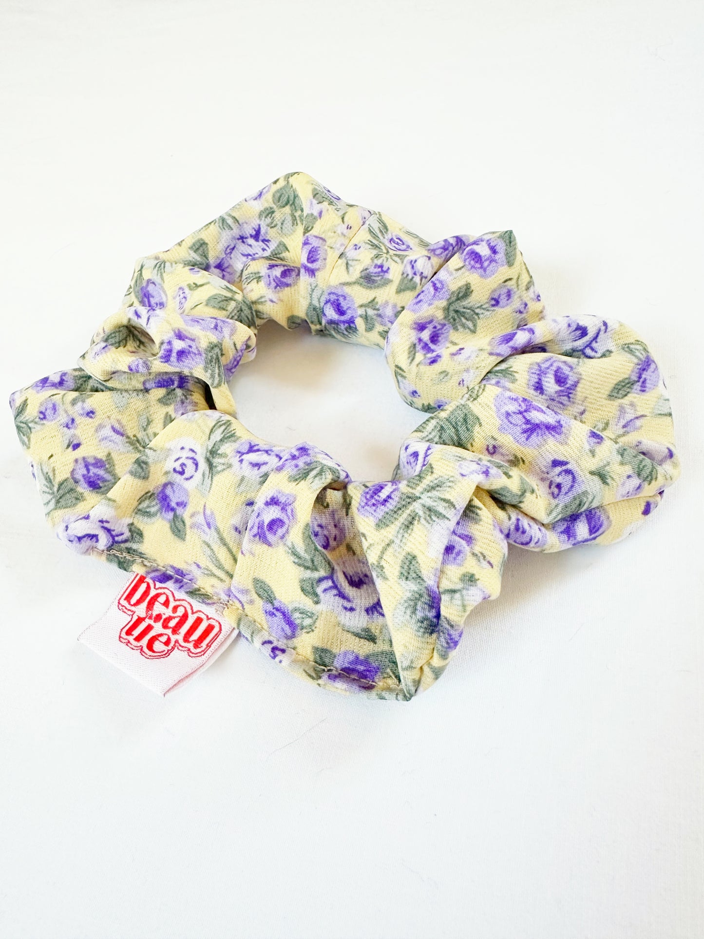 OG scrunchie in lilac and yellow rose print