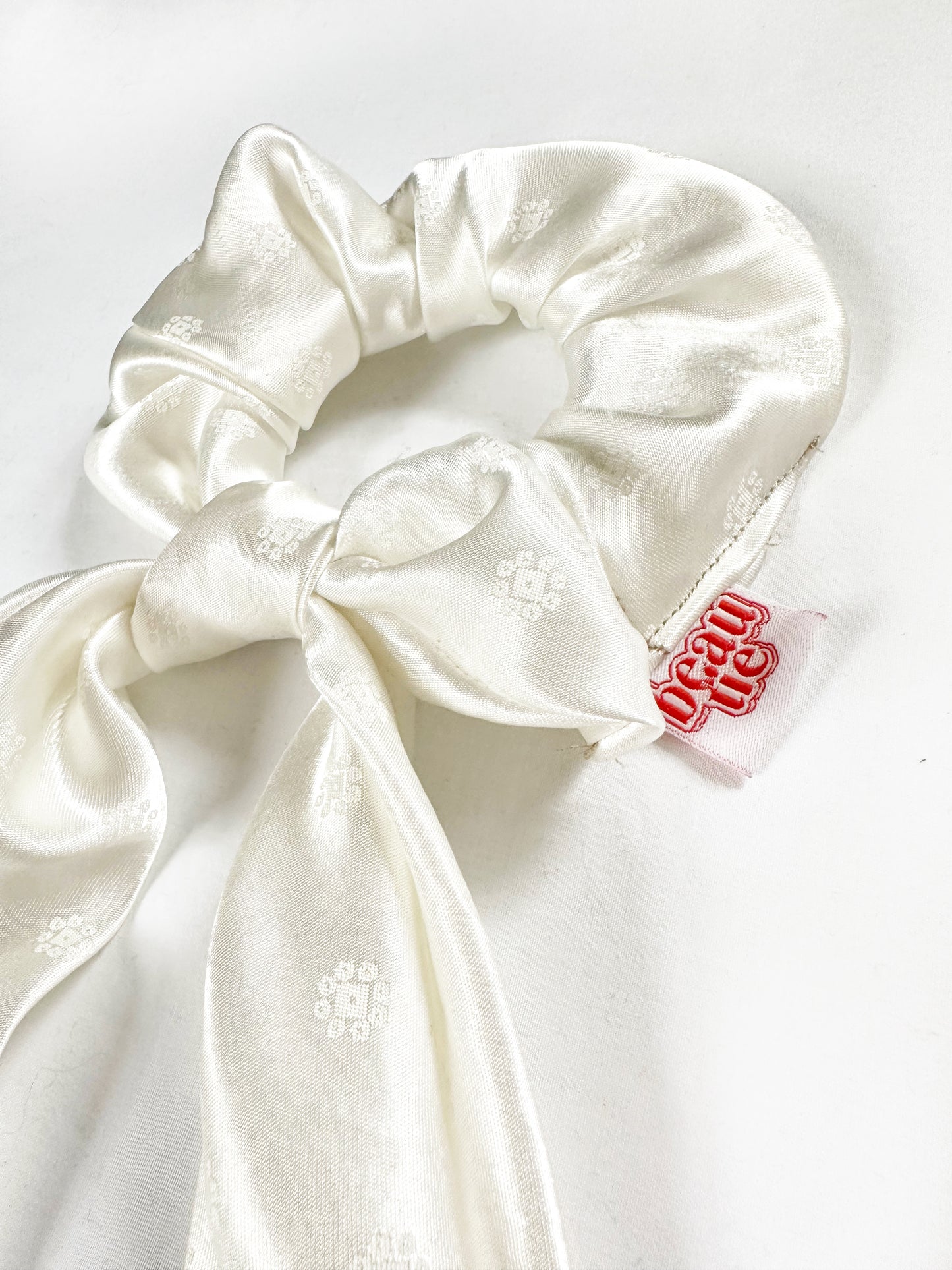 Dolly scarf scrunchie in pearl silk, in regular or mini.