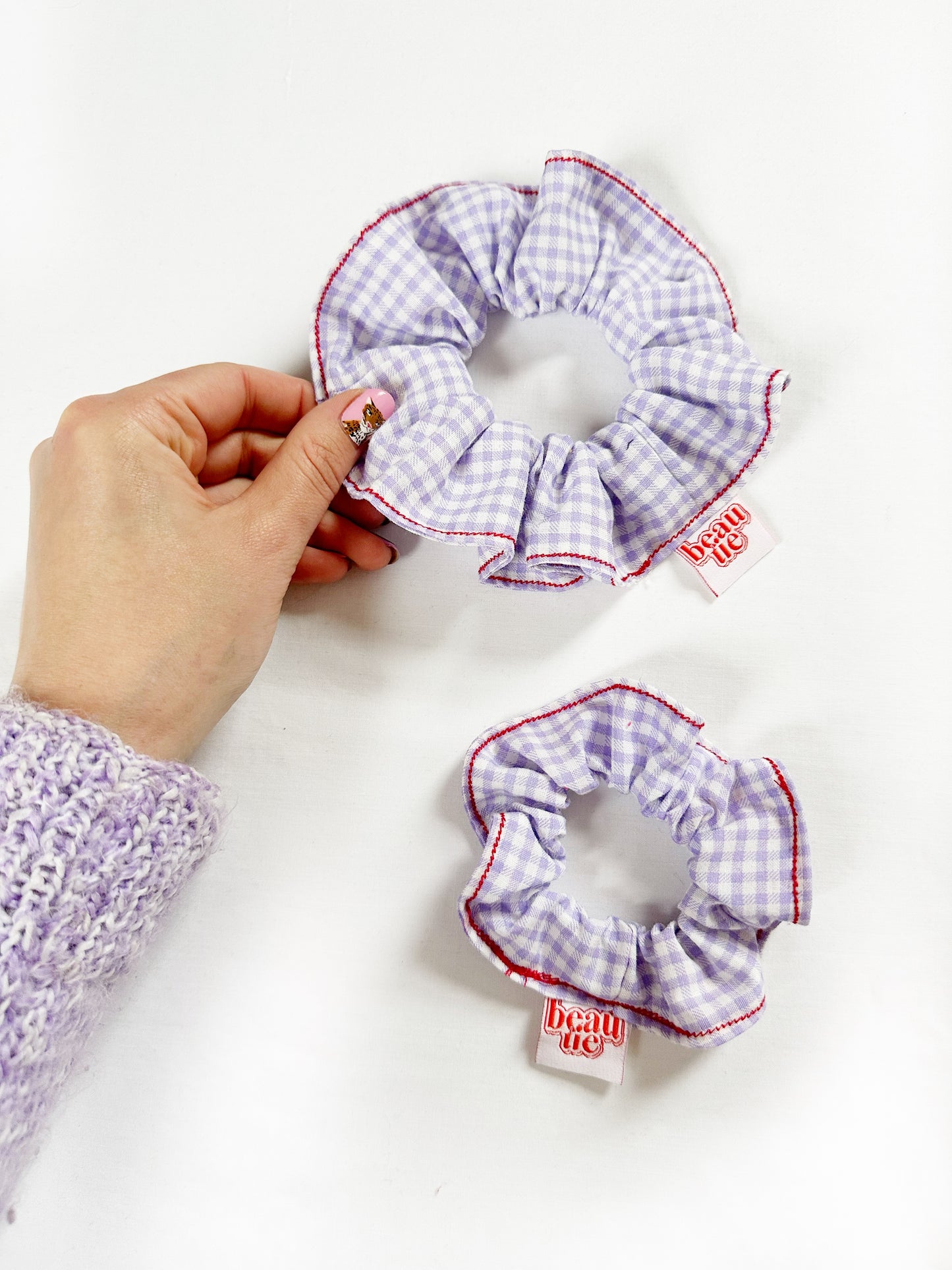 OG scrunchie in gingham and red stitch