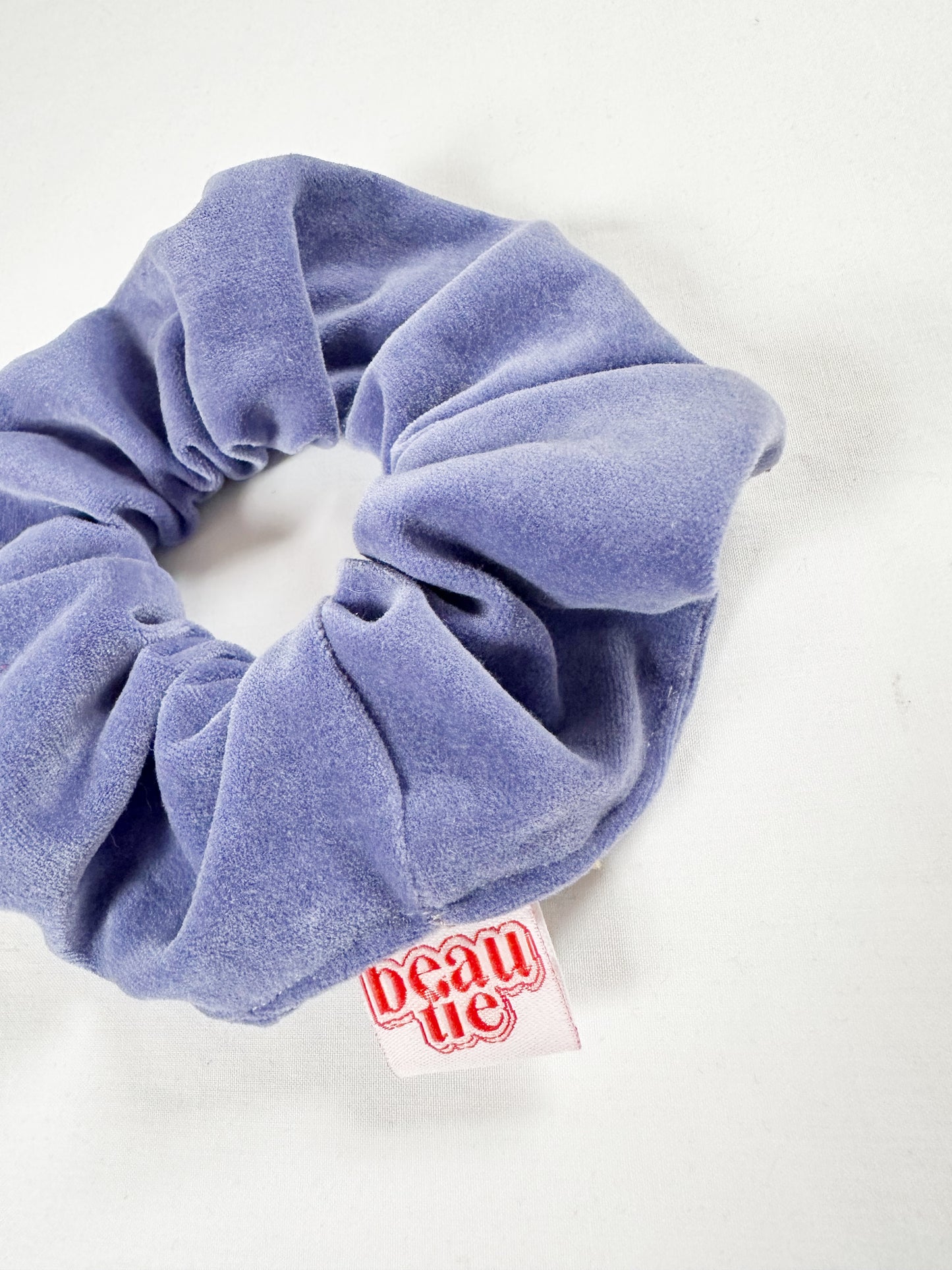 OG scrunchie in periwinkle purple velvet