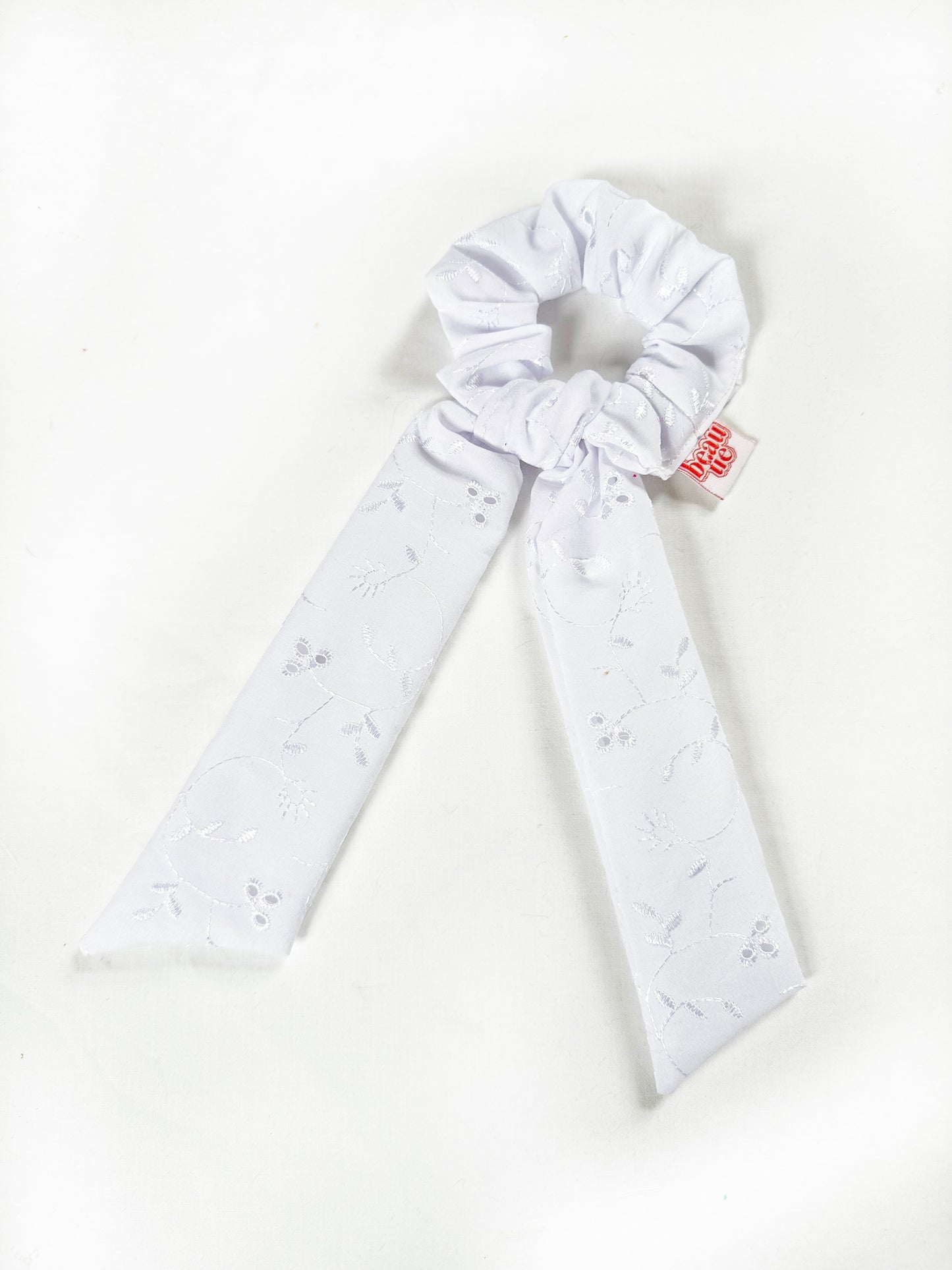 Dolly scarf scrunchie in white broderie, in mini or regular.