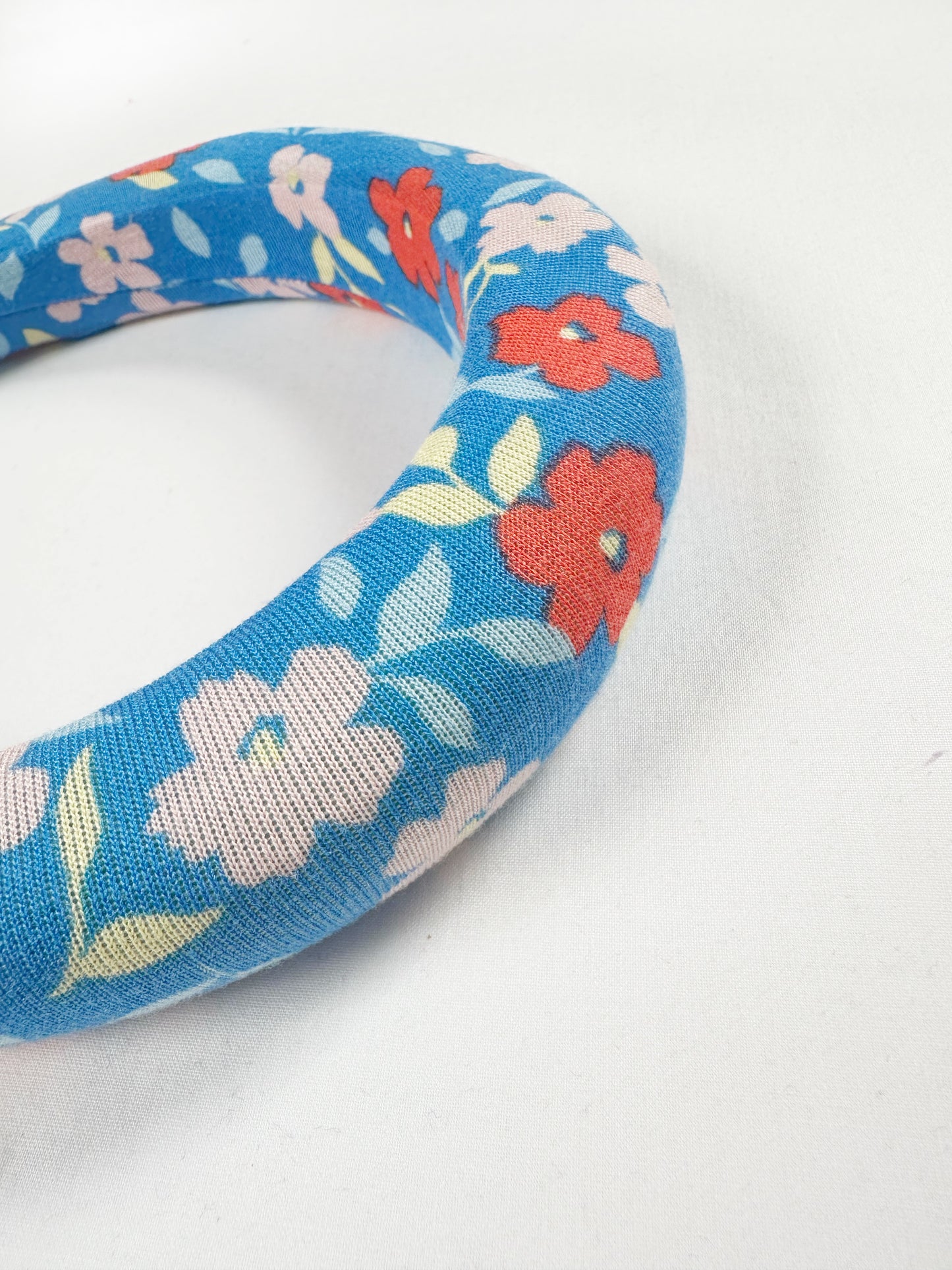 Padded Headband in vibrant blue floral