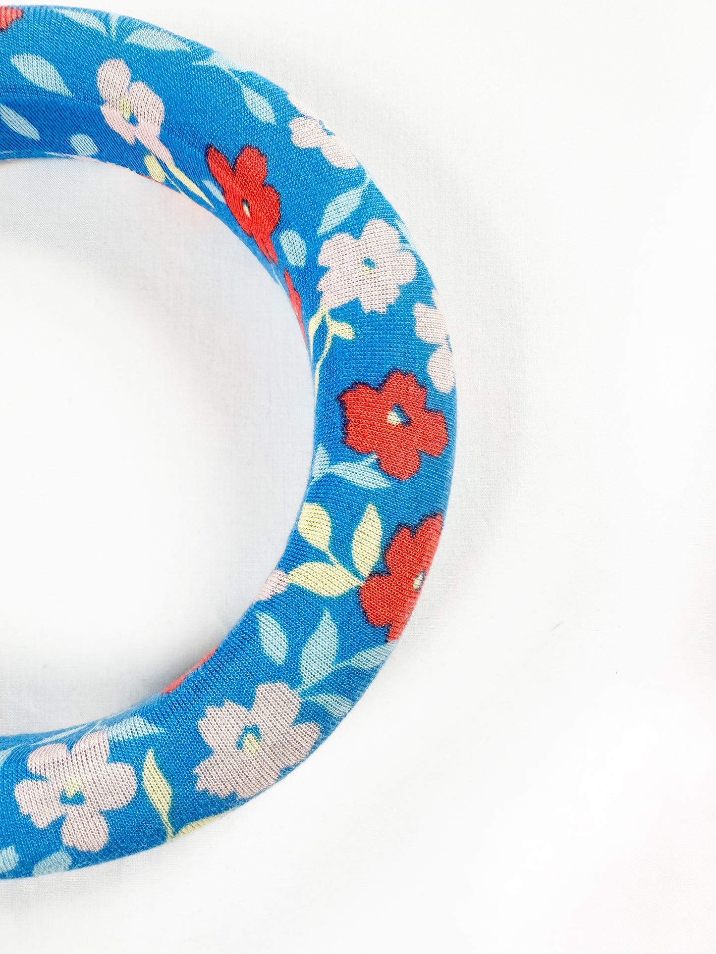 Padded Headband in vibrant blue floral